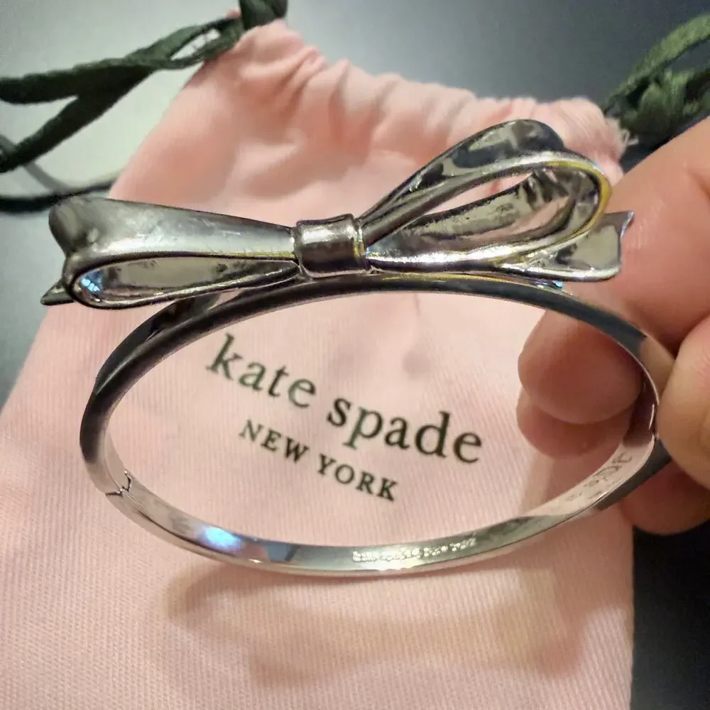 Kate Spade Love Notes Silver Tone Large Bow Hinge Bracelet